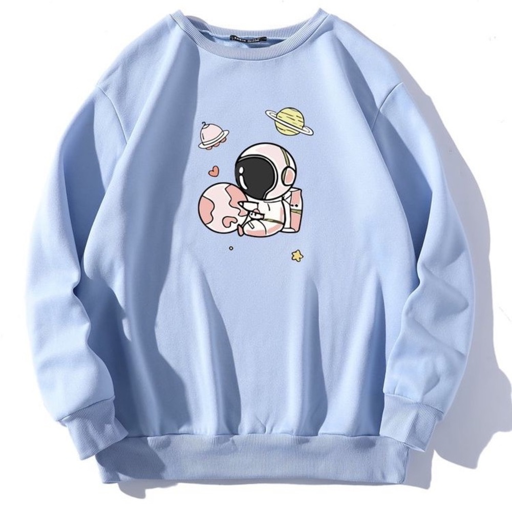 Cute moon,astronaut sweater and it’s 12 and up the size
